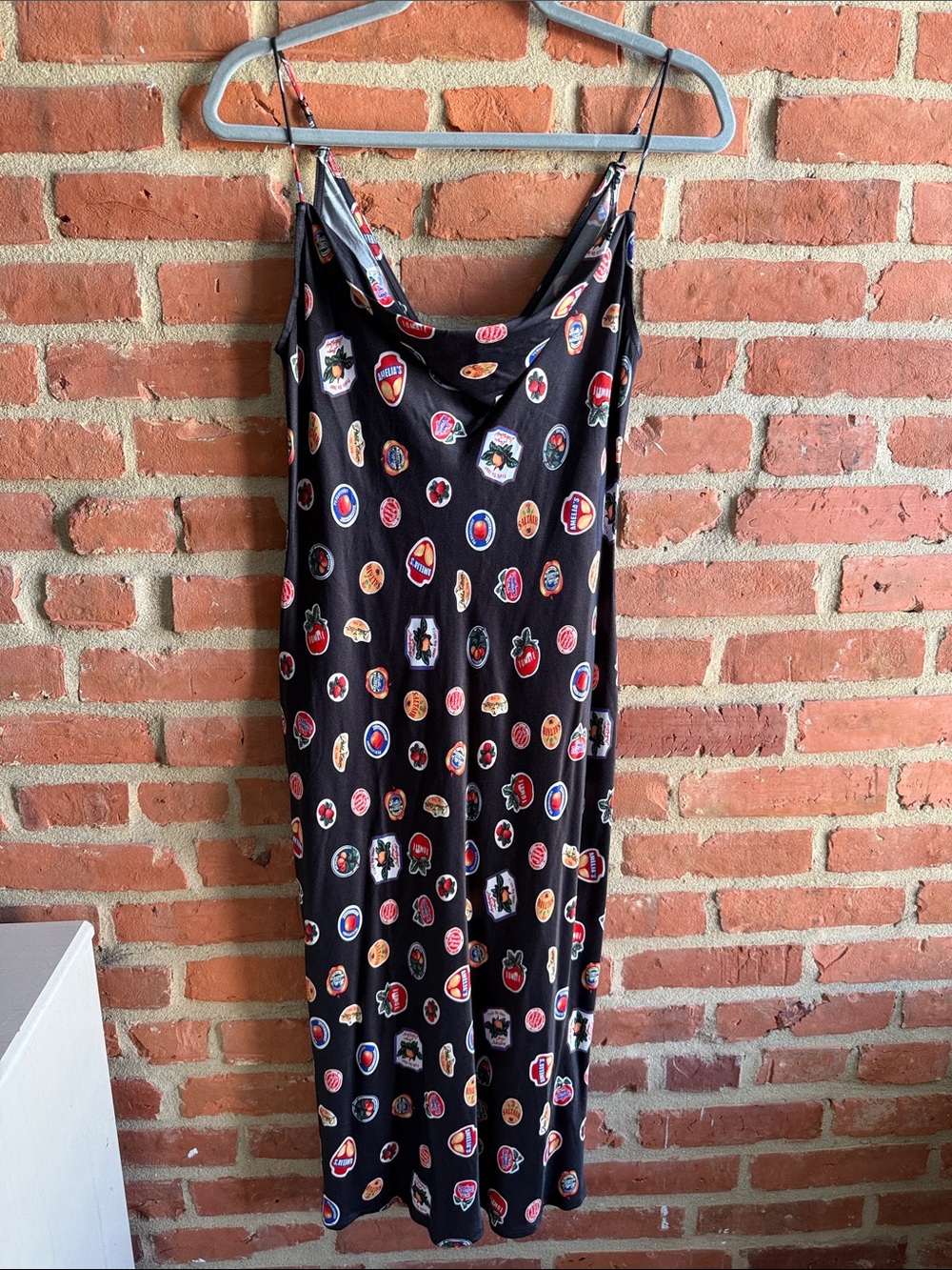 Maeve Black Slip Dress with Multicolor Badge Print